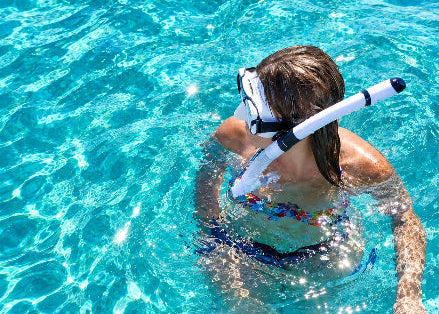 Guardian ambassador snorkeling in a swimming pool wearing MONTEREY ADULT DRY COMBO V22